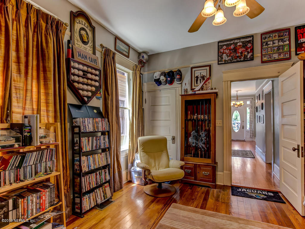2230 Post Street Jacksonville, FL 32204 - Photo 10 of 34 a living room with furniture and a book shelf