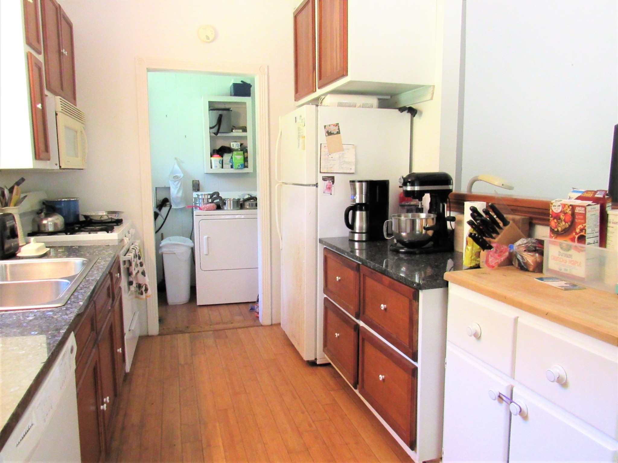 130 Frank Owens Road Lancing, TN 37770 - Photo 6 of 31 a kitchen with granite countertop a sink stove and cabinets