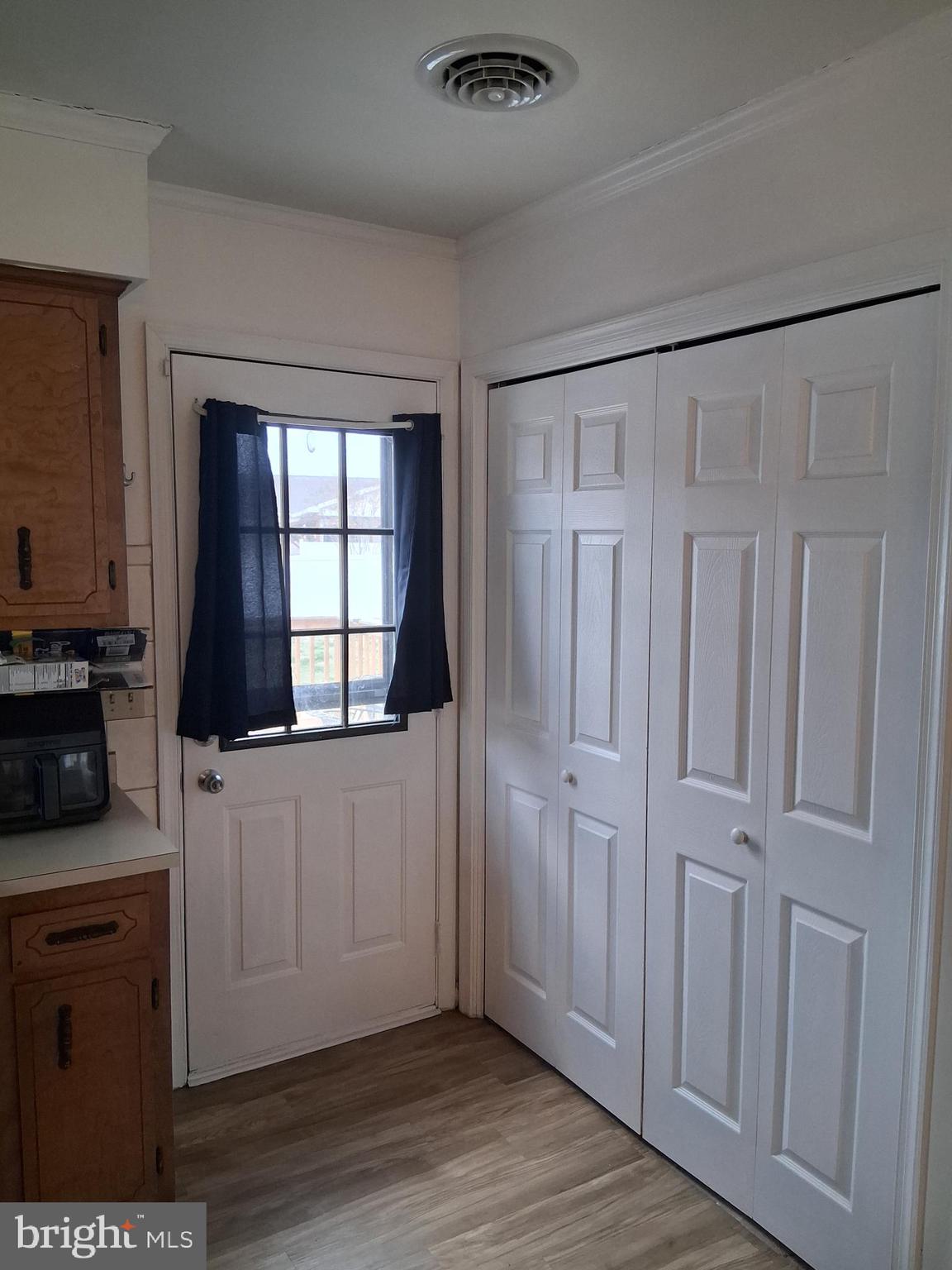 10691 Rifle Range Road Bridgeville, DE 19933 - Photo 13 of 31 kit back door and laundry area