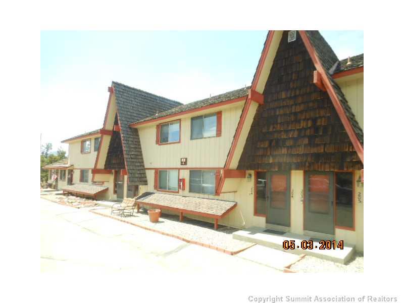 70 Evergreen Road, Unit A105 Dillon, CO 80435 - Photo 2 of 11 a outdoor space with a car parked in front of it