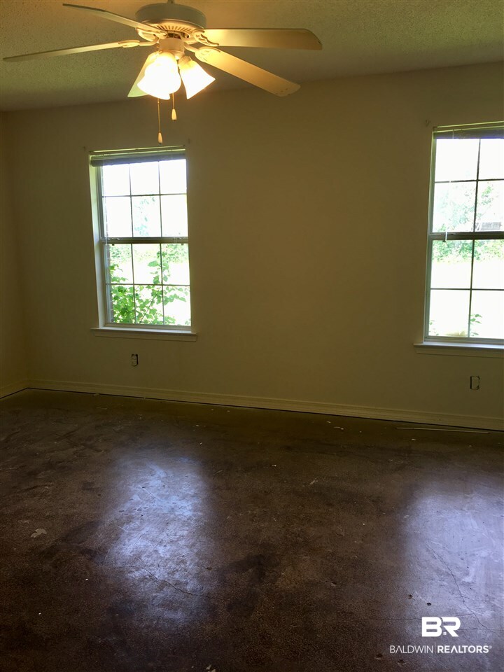 1458 Hunters Ridge Drive West Mobile, AL 36695 - Photo 11 of 15 The master bedroom is in the back of house