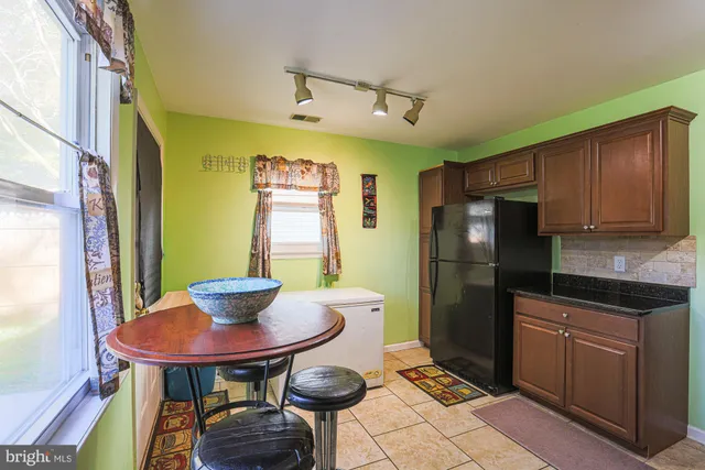 a workspace with furniture and window