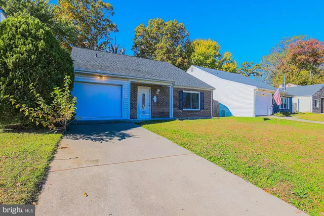 a house with trees in the background
