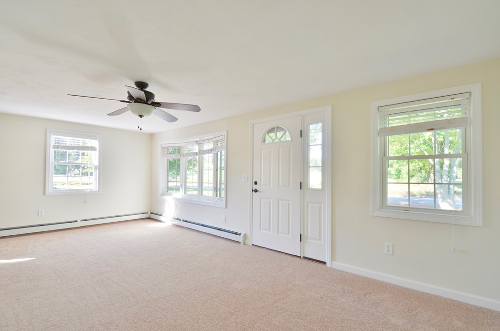 1117 Thompson Road Thompson, CT 06277 - Photo 14 of 20 a view of an empty room with a window