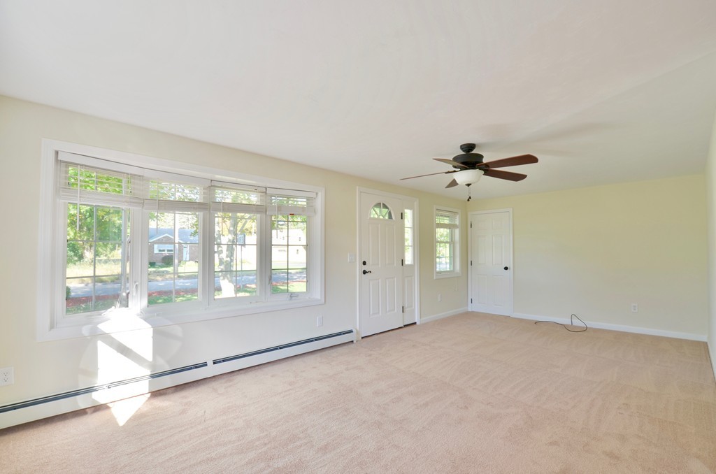 1117 Thompson Road Thompson, CT 06277 - Photo 15 of 20 a view of an empty room with a window