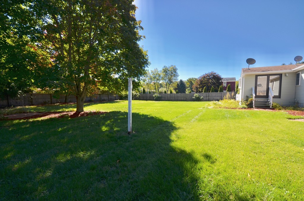 1117 Thompson Road Thompson, CT 06277 - Photo 4 of 20 a view of a house with a backyard