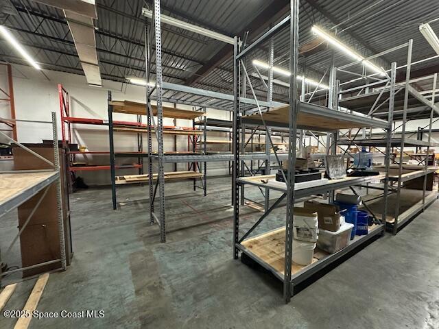 205 South Wickham Road Melbourne, FL 32904 - Photo 5 of 10 a view of a room with gym equipment