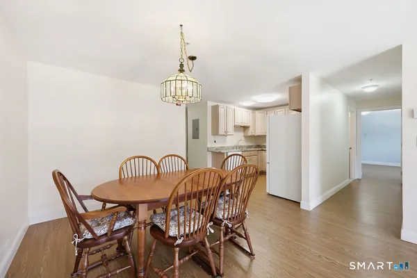a view of a dining room with furniture