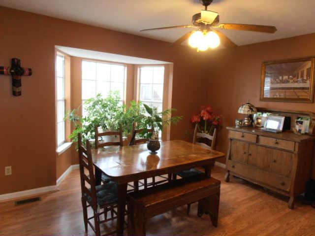 1568 Camp Ravine Road Burns, TN 37029 - Photo 20 of 20 a view of a dining room with furniture and window