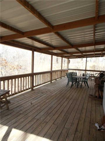 1568 Camp Ravine Road Burns, TN 37029 - Photo 6 of 20 a view of outdoor space with wooden floor