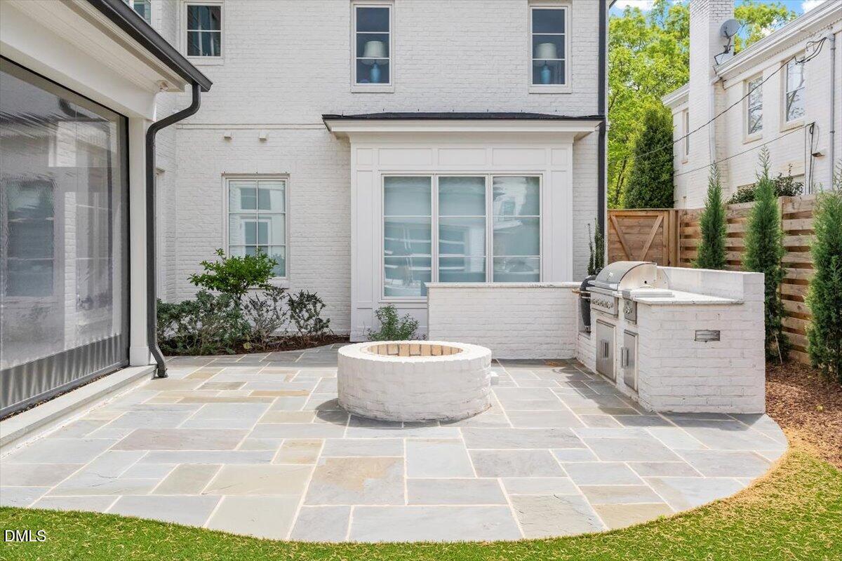 2123 St Marys Street Raleigh, NC 27608 - Photo 59 of 77 a front view of a house with a yard
