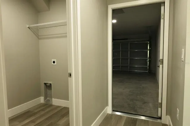 a bathroom with a granite countertop toilet a sink and bathtub