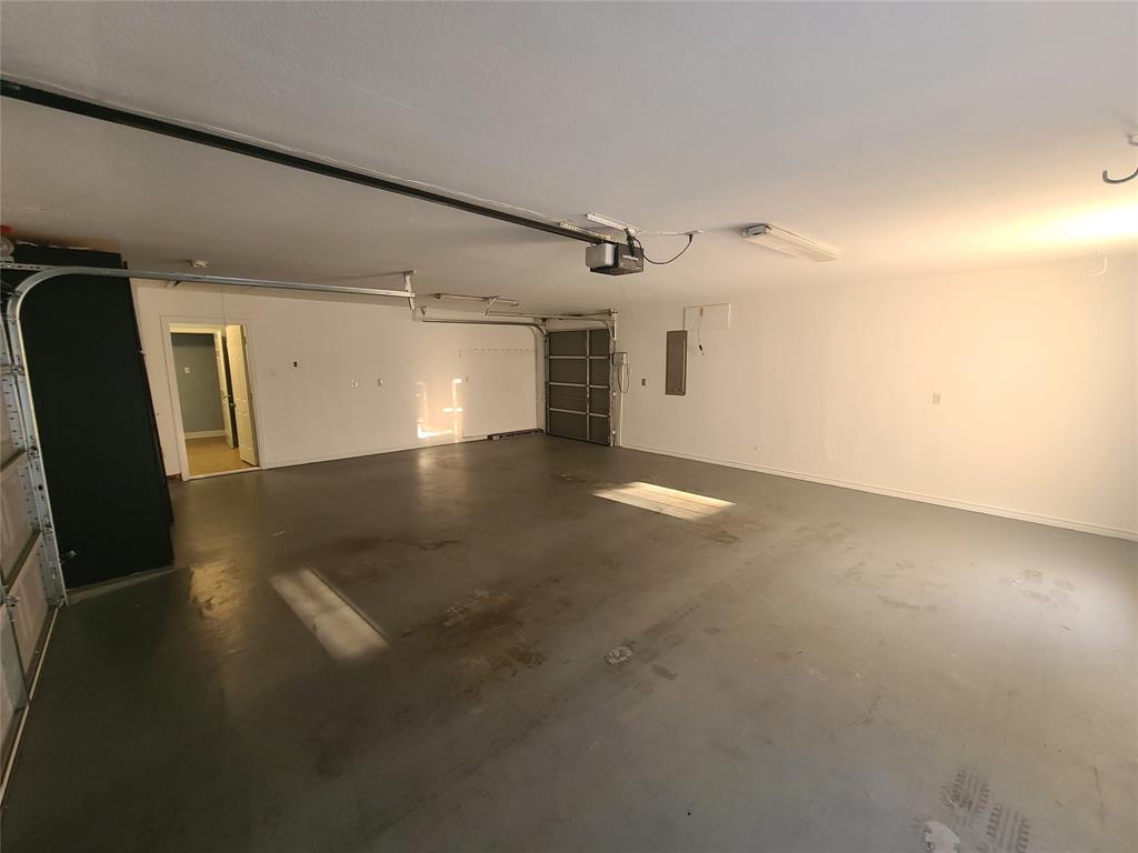 8921 Bontura Road Granbury, TX 76049 - Photo 11 of 26 an empty room with windows