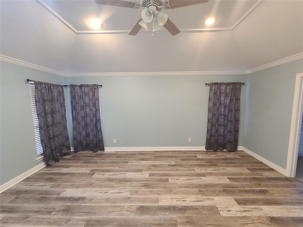 8921 Bontura Road Granbury, TX 76049 - Photo 15 of 26 a view of an empty room with a window