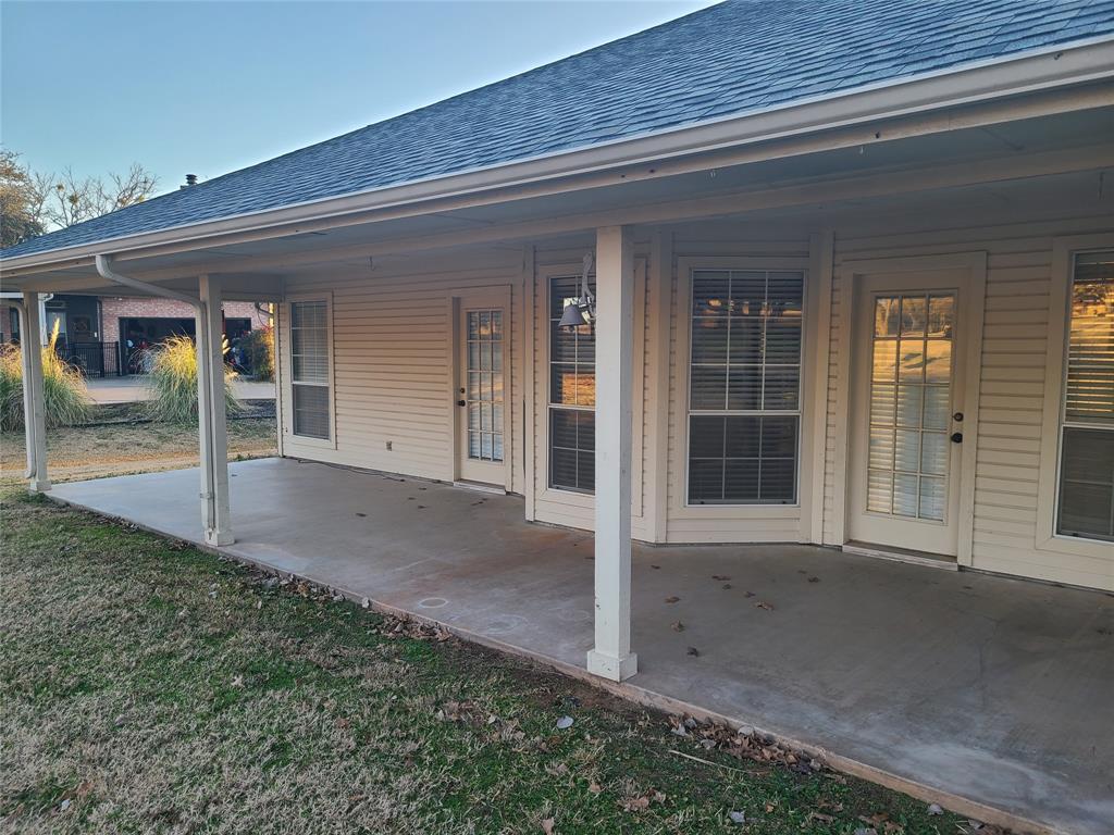 8921 Bontura Road Granbury, TX 76049 - Photo 26 of 26 front view of a house with a porch