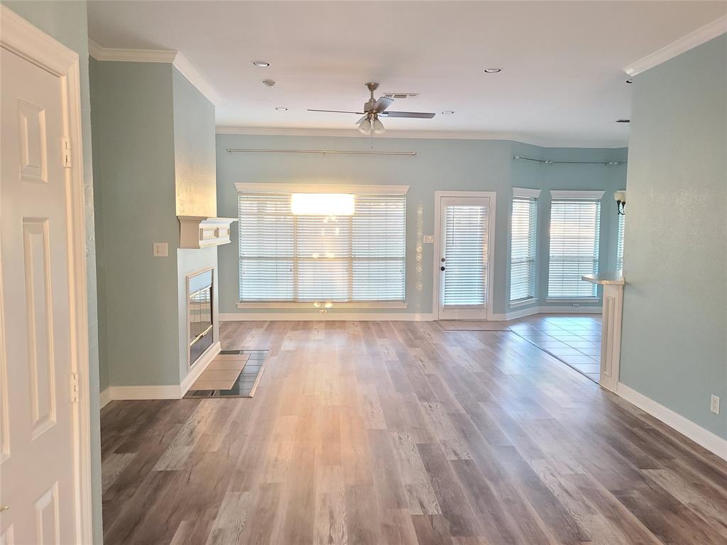 8921 Bontura Road Granbury, TX 76049 - Photo 4 of 26 wooden floor in an empty room