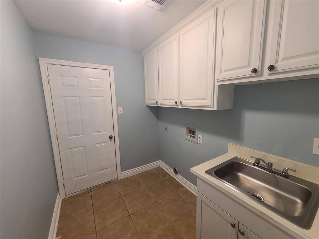 8921 Bontura Road Granbury, TX 76049 - Photo 8 of 26 a room with storage and utility