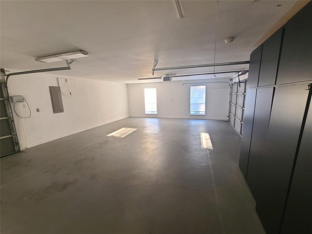 8921 Bontura Road Granbury, TX 76049 - Photo 10 of 26 a view of empty room with windows