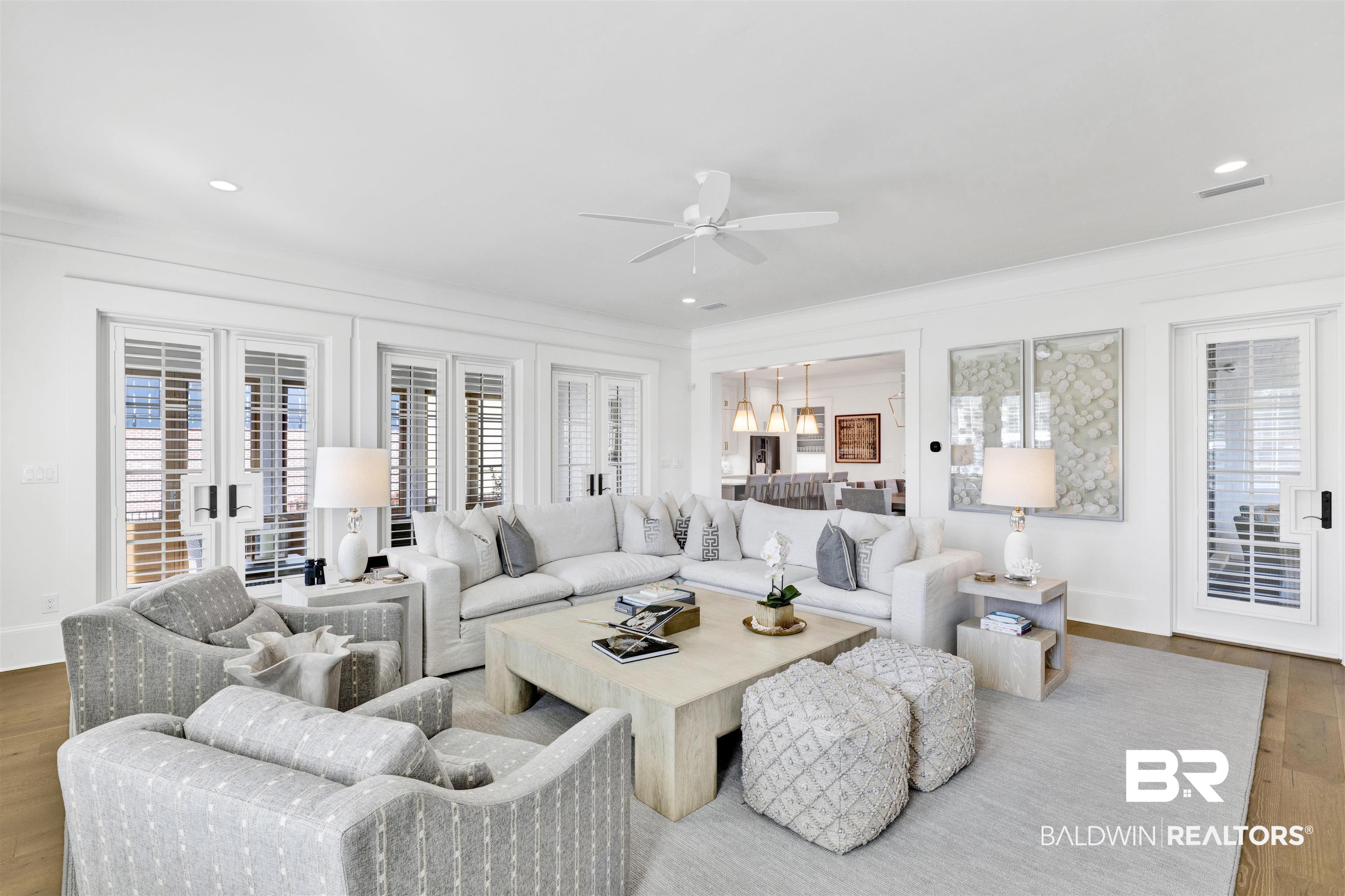 861 Inlet Circle Gulf Shores, AL 36542 - Photo 14 of 54 Living room featuring wood finished floors, french doors, ceiling fan, healthy amount of natural light, and recessed lighting