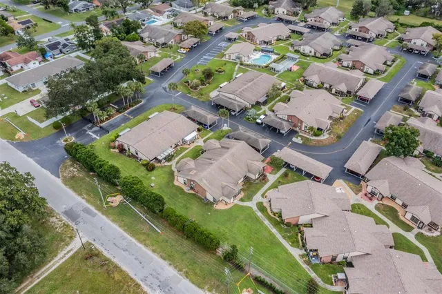 an aerial view of a city with lots of residential buildings