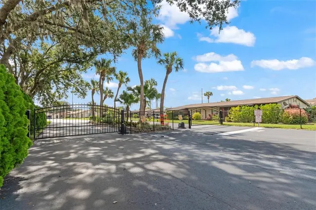 a view of a street with a building in the background