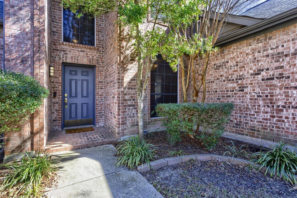 3306 Harbor Pointe Drive Rowlett, TX 75088 - Photo 2 of 40 Beautiful brick exterior and solar screen shades