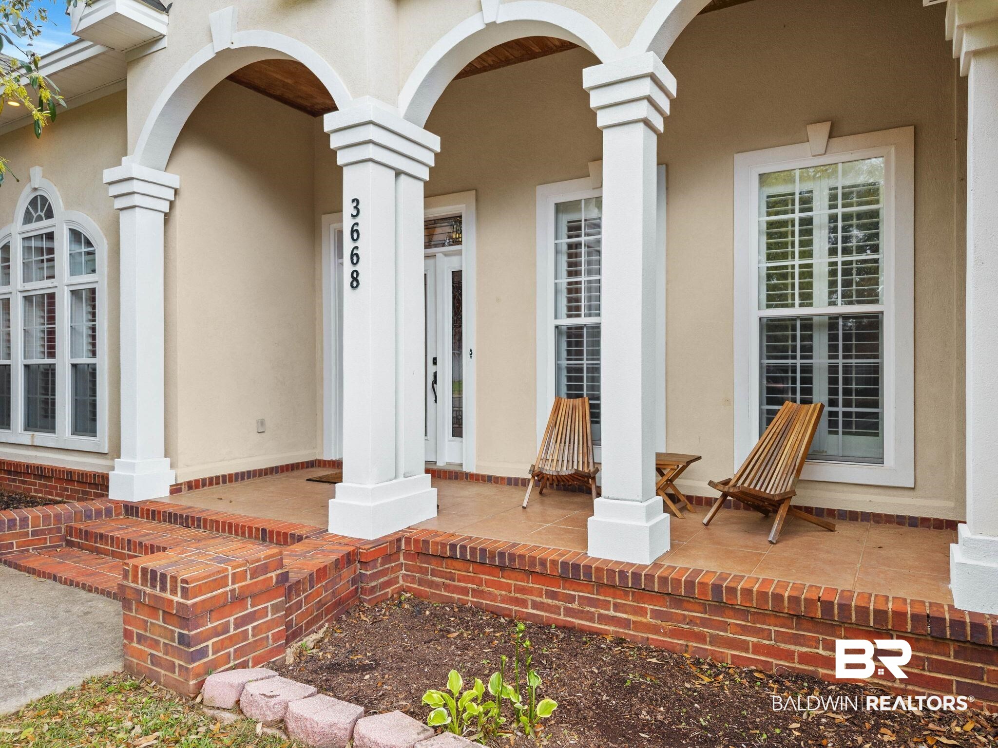 3668 Claridge Road North Mobile, AL 36608 - Photo 22 of 100 Property entrance featuring a porch and stucco siding