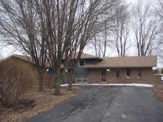 28W726 Wagner Road Naperville, IL 60564 - Photo 2 of 22 a front view of a house with a yard