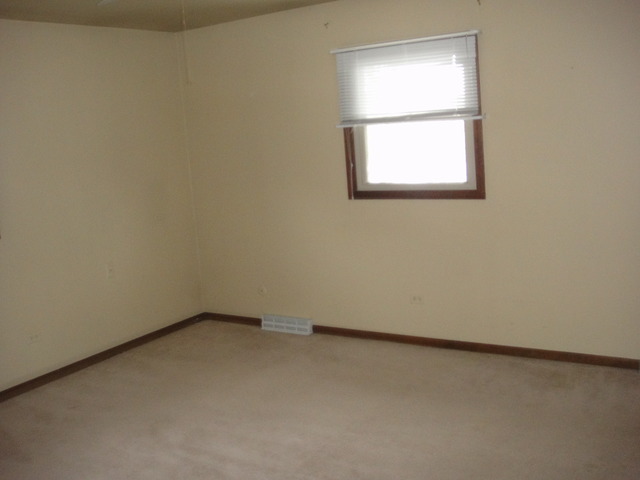 28W726 Wagner Road Naperville, IL 60564 - Photo 19 of 22 an empty room with a window