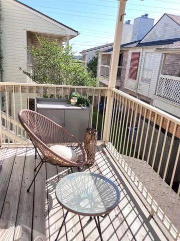 a view of a chair in wooden deck