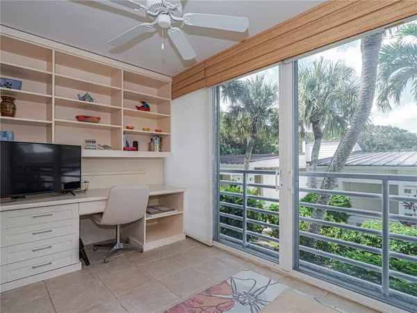 a room with furniture and a flat screen tv