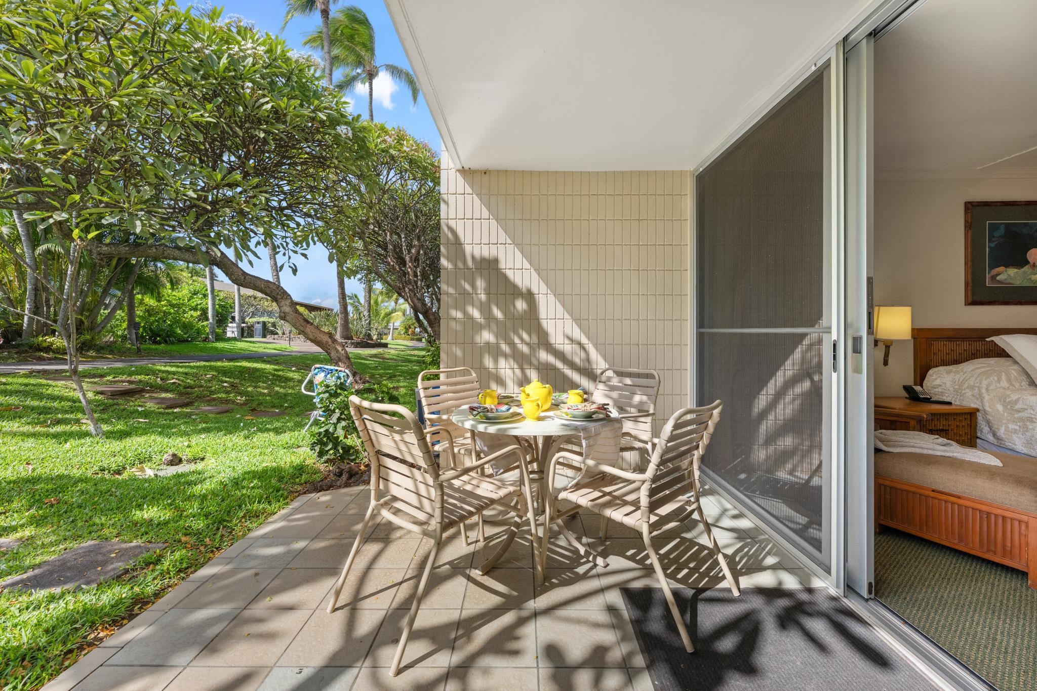 5315 Lower Honoapiilani Road, Unit D128 Lahaina, HI 96761 - Photo 11 of 24 a view of a swimming pool with a lounge chairs