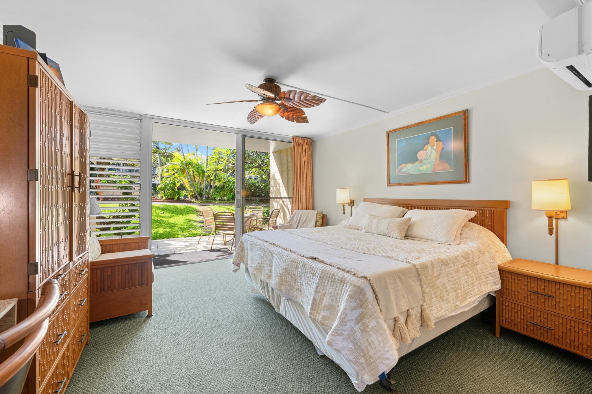 5315 Lower Honoapiilani Road, Unit D128 Lahaina, HI 96761 - Photo 3 of 24 a bedroom with a bed and a couch