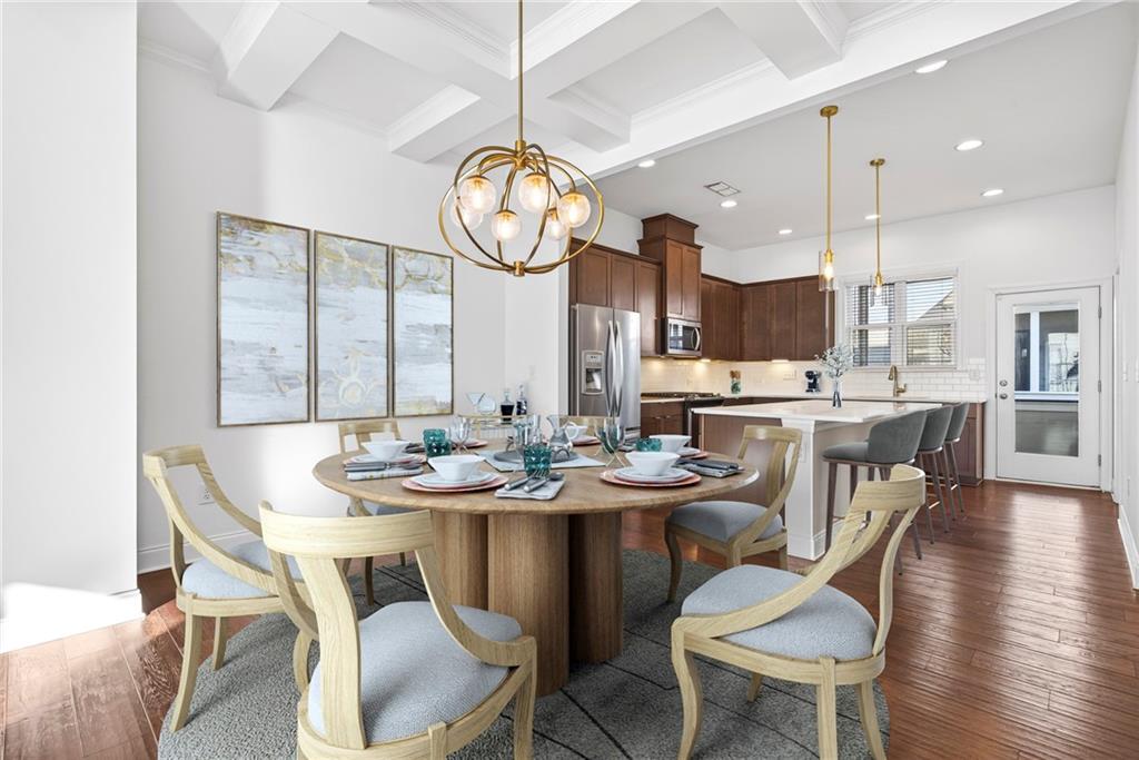 1752 Morningtide Lane Northeast Atlanta, GA 30324 - Photo 18 of 57 a dining room with furniture a large window and stainless steel appliances