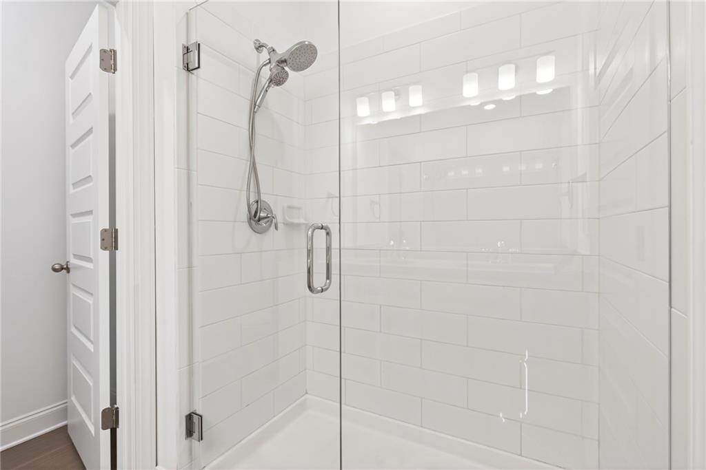 1752 Morningtide Lane Northeast Atlanta, GA 30324 - Photo 37 of 57 a bathroom with a shower