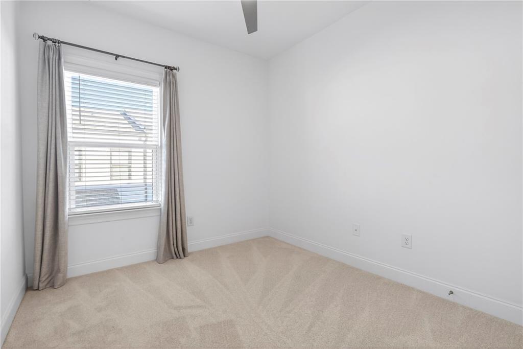 1752 Morningtide Lane Northeast Atlanta, GA 30324 - Photo 39 of 57 an empty room with a window