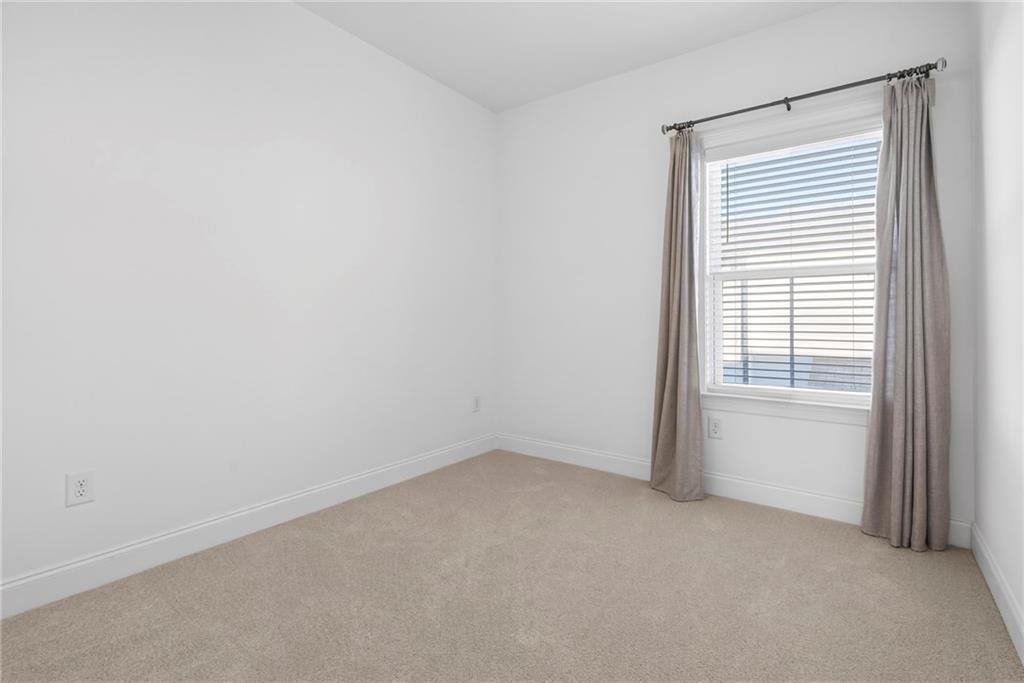 1752 Morningtide Lane Northeast Atlanta, GA 30324 - Photo 42 of 57 a view of an empty room with a window