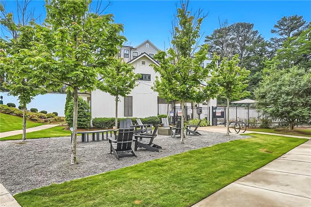 1752 Morningtide Lane Northeast Atlanta, GA 30324 - Photo 52 of 57 a view of a chair and table on the garden