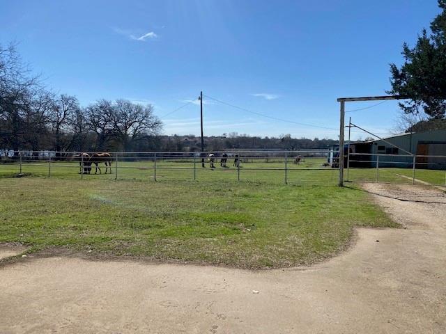 180 Highland Village Road Highland Village, TX 75077 - Photo 3 of 6 a view of a golf course with a lake view