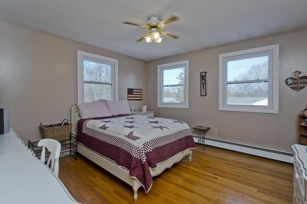 1161 Morgan Road West Springfield, MA 01089 - Photo 24 of 42 a bed sitting in a bedroom next to a window