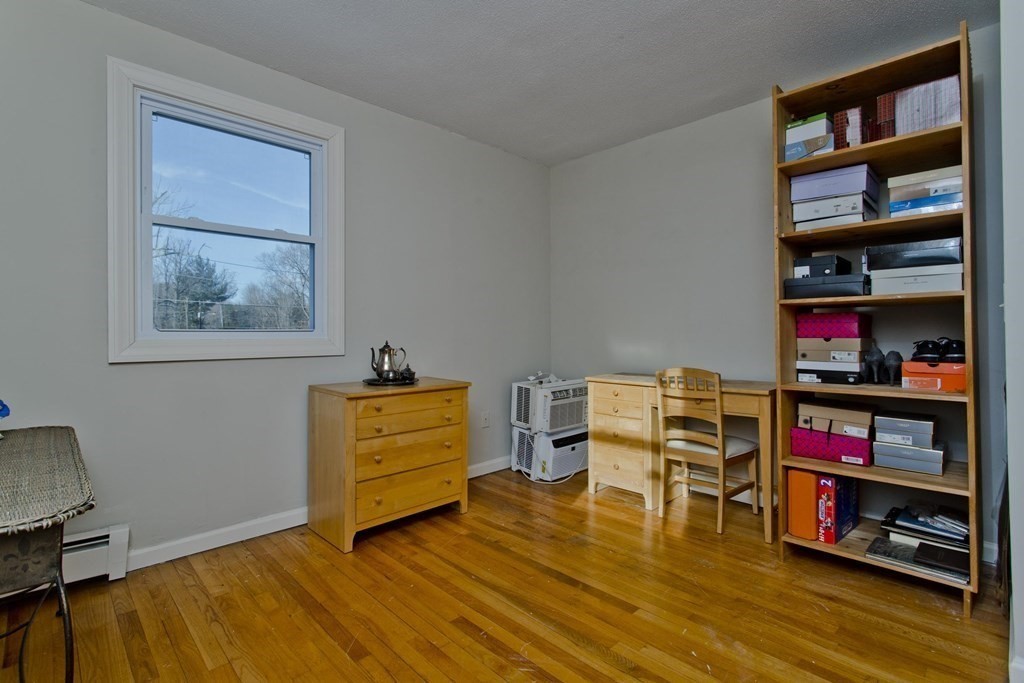 1161 Morgan Road West Springfield, MA 01089 - Photo 30 of 42 a room with furniture and a book shelf