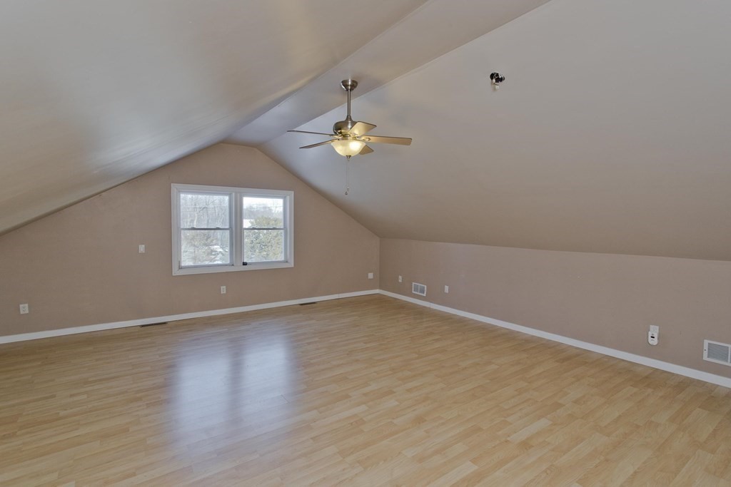 1161 Morgan Road West Springfield, MA 01089 - Photo 38 of 42 wooden floor in an empty room with a window