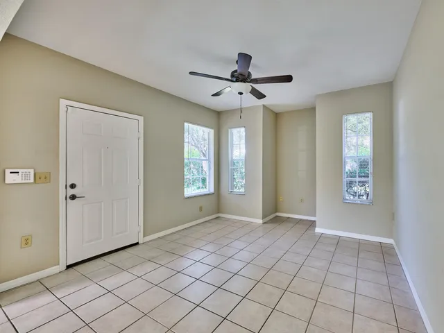 a kitchen with stainless steel appliances granite countertop a stove sink and cabinets