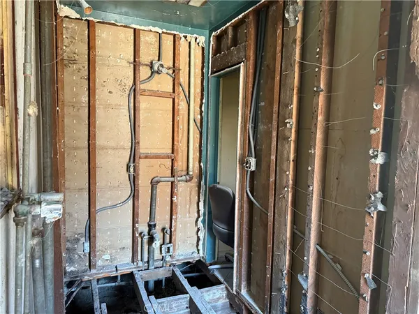 a view of walk in closet with large window