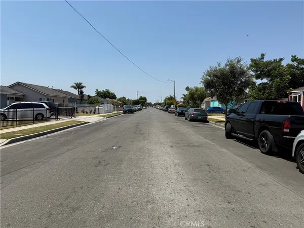 a view of a street with cars