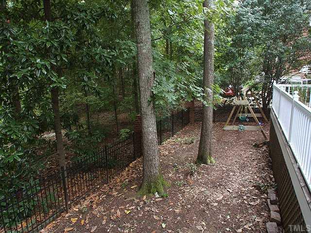 3201 Brantford Place Raleigh, NC 27607 - Photo 11 of 12 a view of a yard