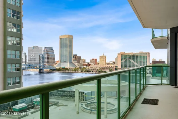 a view of a balcony with city view