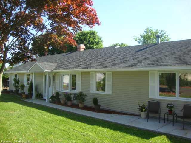 85 Corn Tassel Road Bridgeport, CT 06606 - Photo 1 of 1 a view of house with a yard