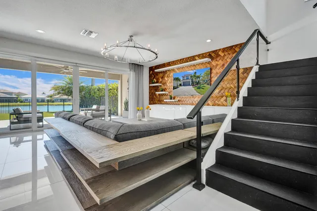 a bathroom with a sink a toilet a vanity and mirror