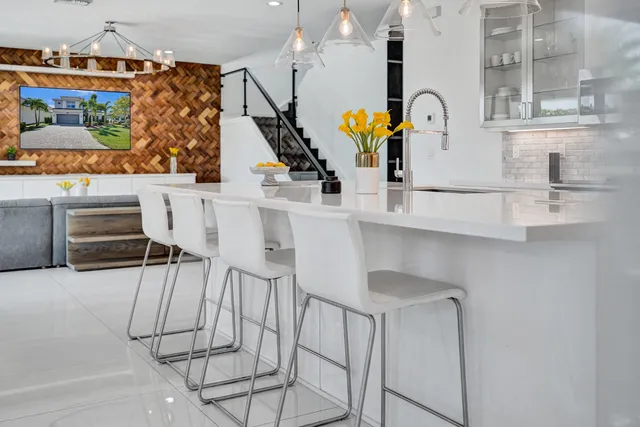 a view of a city with lots of residential buildings lake and ocean view